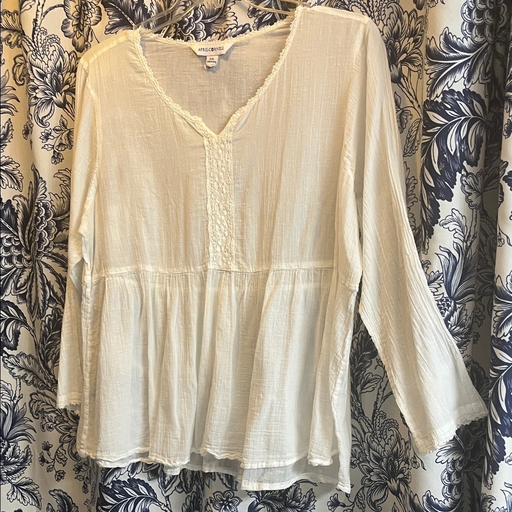 April Cornell Cream V-Neck Blouse in good condition. Very light fabric.